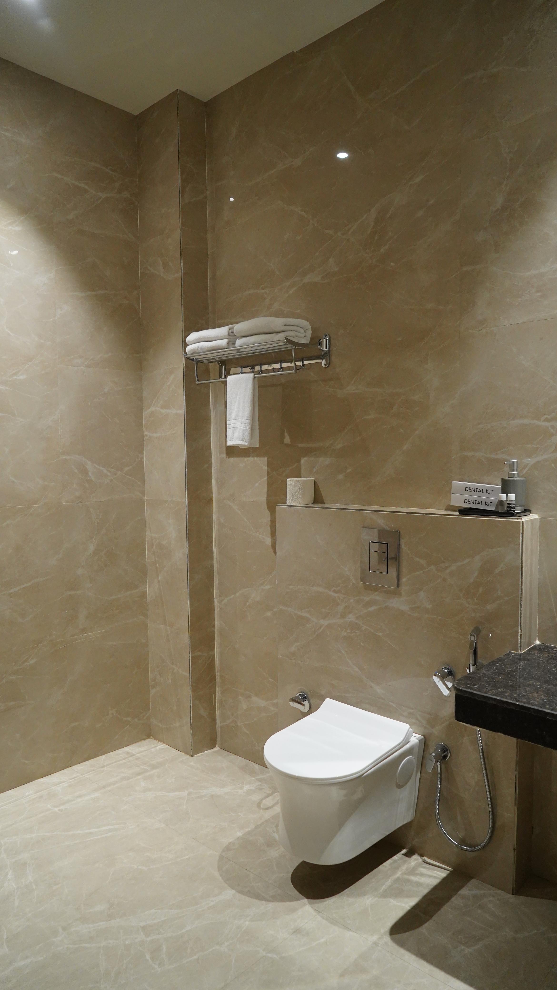 Clean modern attached bathroom at THE ROYAL KING hotel Ludhiana